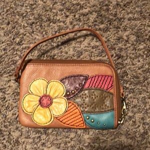 Cute leather fossil wristlet